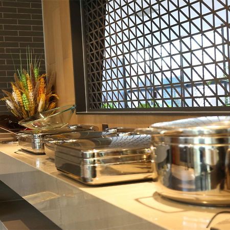 Qiu Guo Hotel Hua Mao Chaoyang  Dış mekan fotoğraf